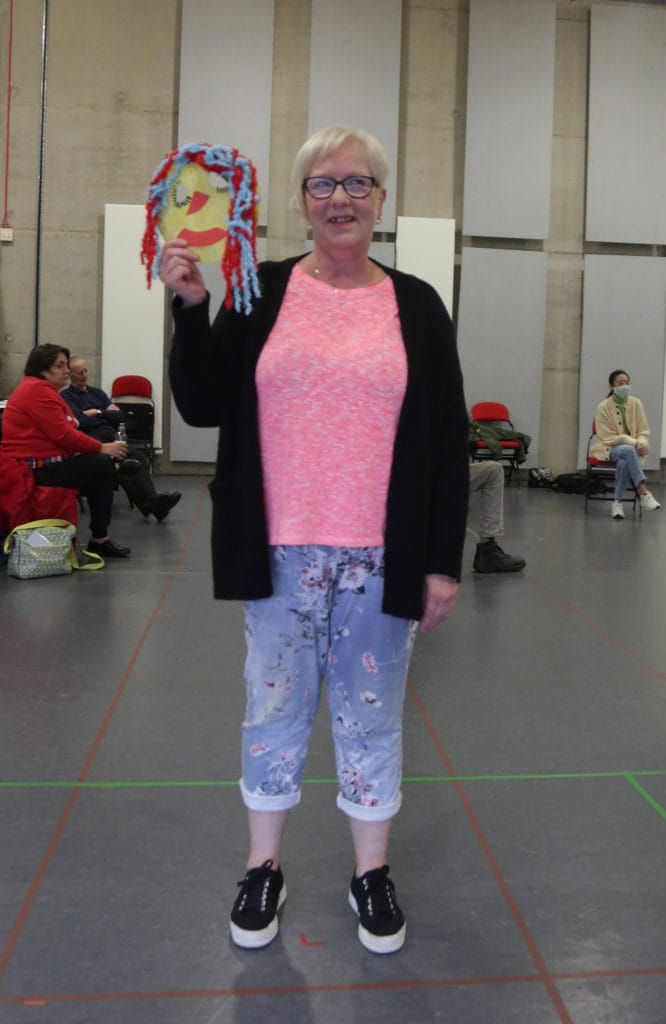 Underground Lights member Tracy holding a homemade mask