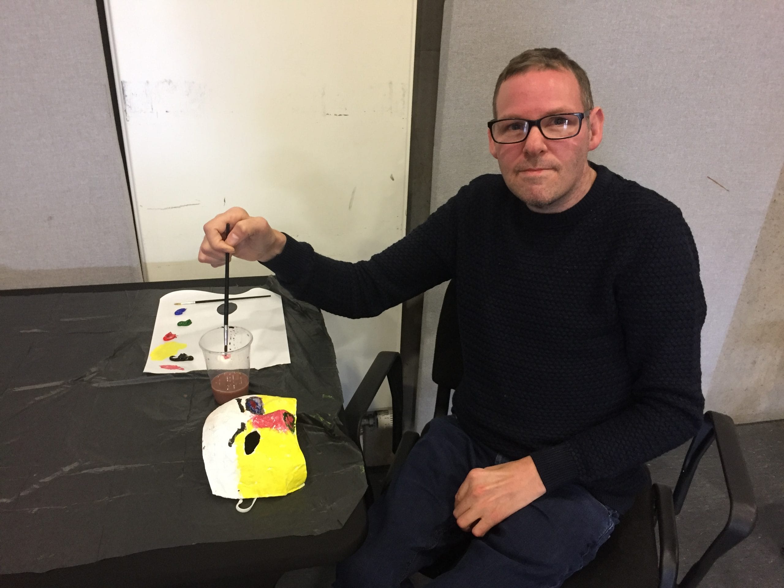 Underground Lights member Kelvin painting his mask