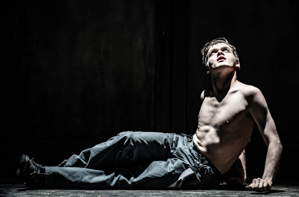 1060 Zak Ford-Williams on stage in The Real and Imagined History of the Elephant Man. Photo by Marc Brenner.
