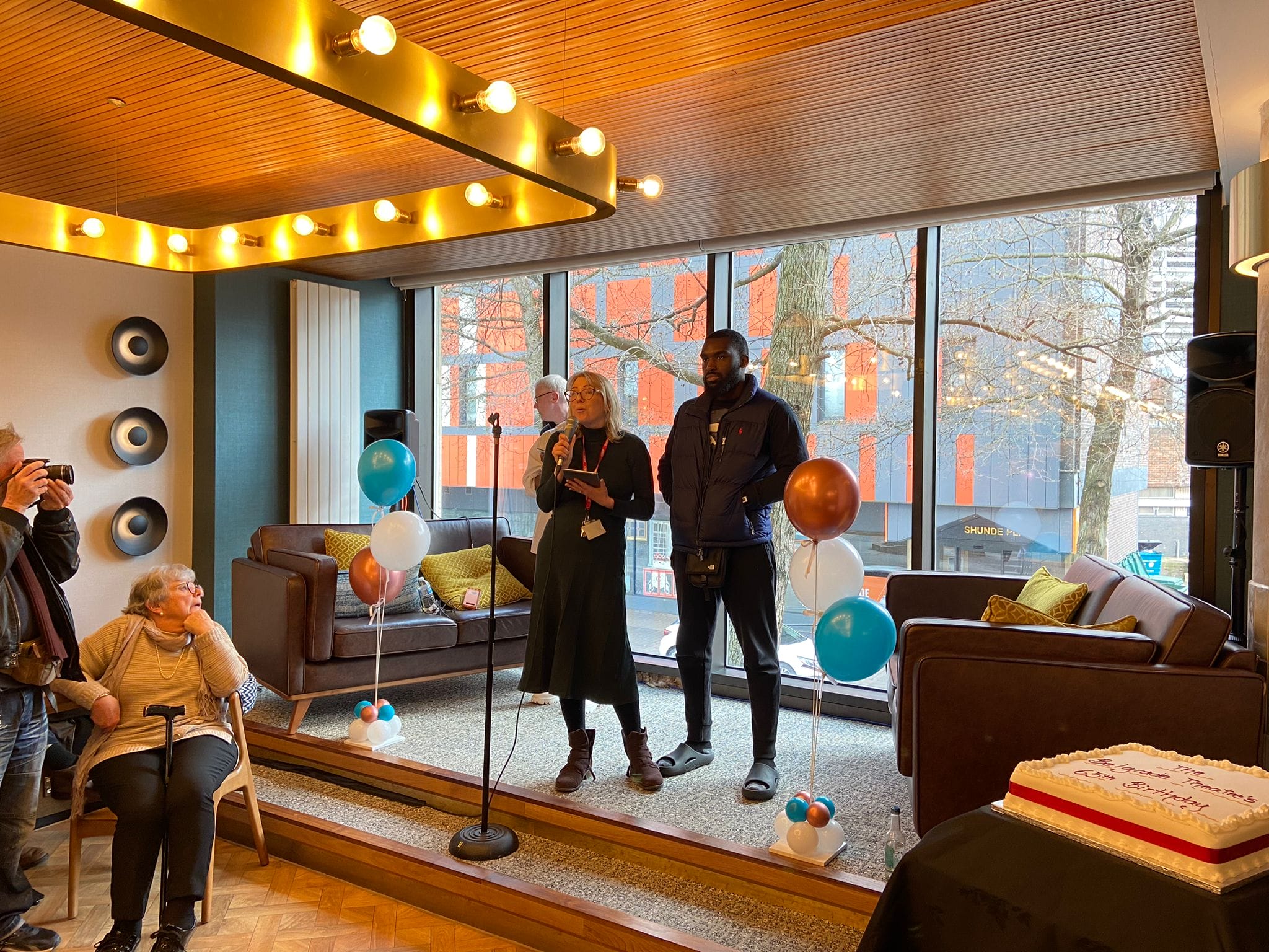 Belgrade's CEO Laura Elliot & Creative Director Corey Campbell make a speech.