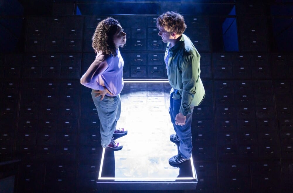 Joe Layton (Robbie) and Hannah Sinclair Robinson (Jess) in Lost Atoms. Lost Atoms is Frantic Assembly's 30th Anniversary production. Cr. Tristram Kenton.