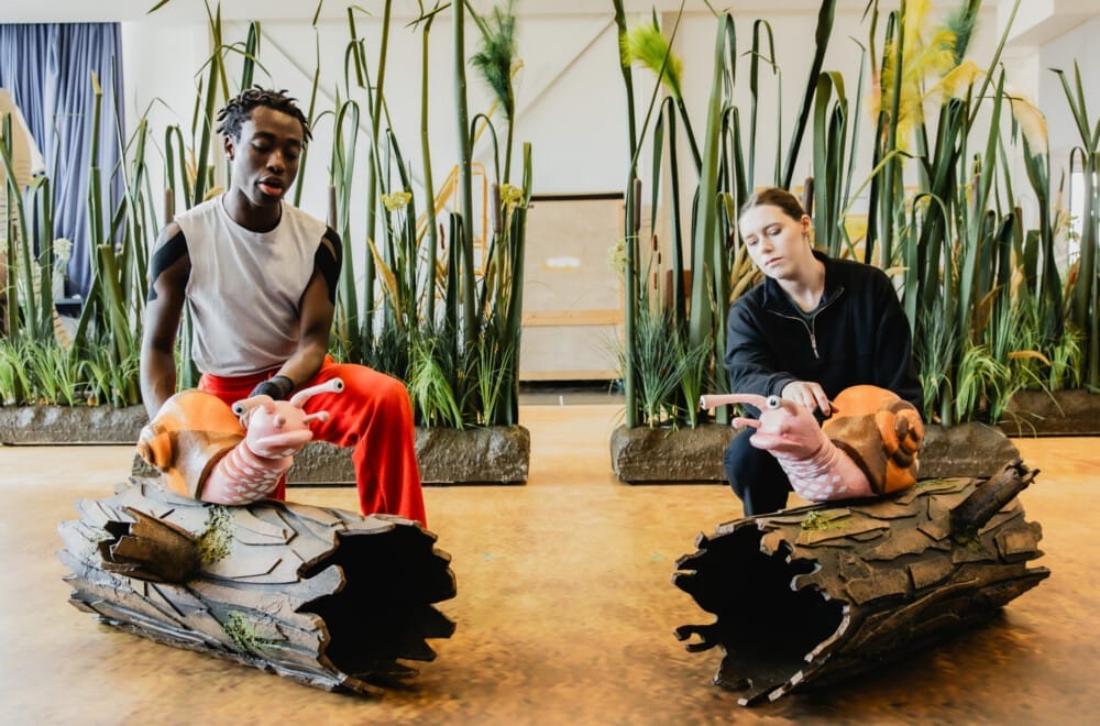 The UK Tour cast rehearsing The Enormous Crocodile.